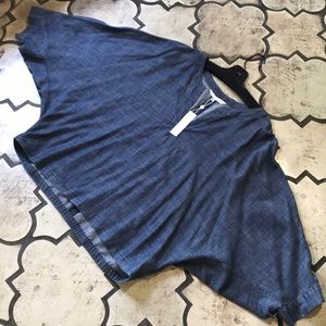 Trina Turk indigo batwing top.